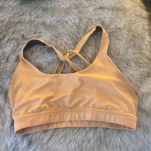 Sports bra. Strappy orange color! So cute on!